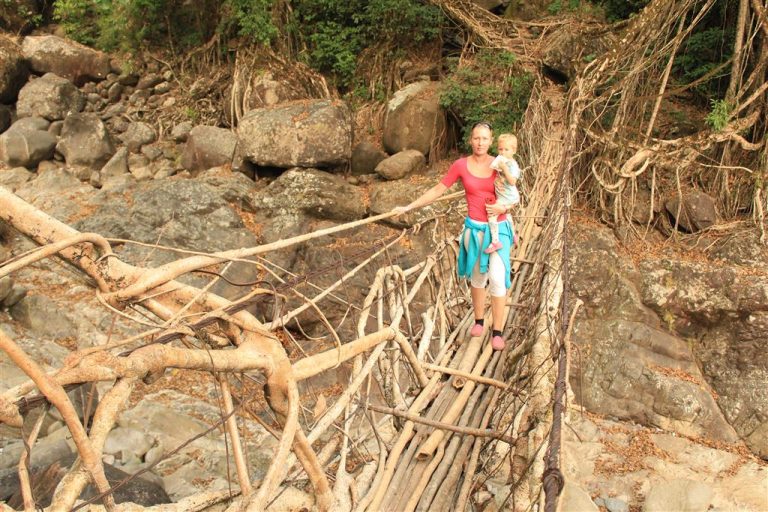 Crossing a living root bridge in Megahlaya